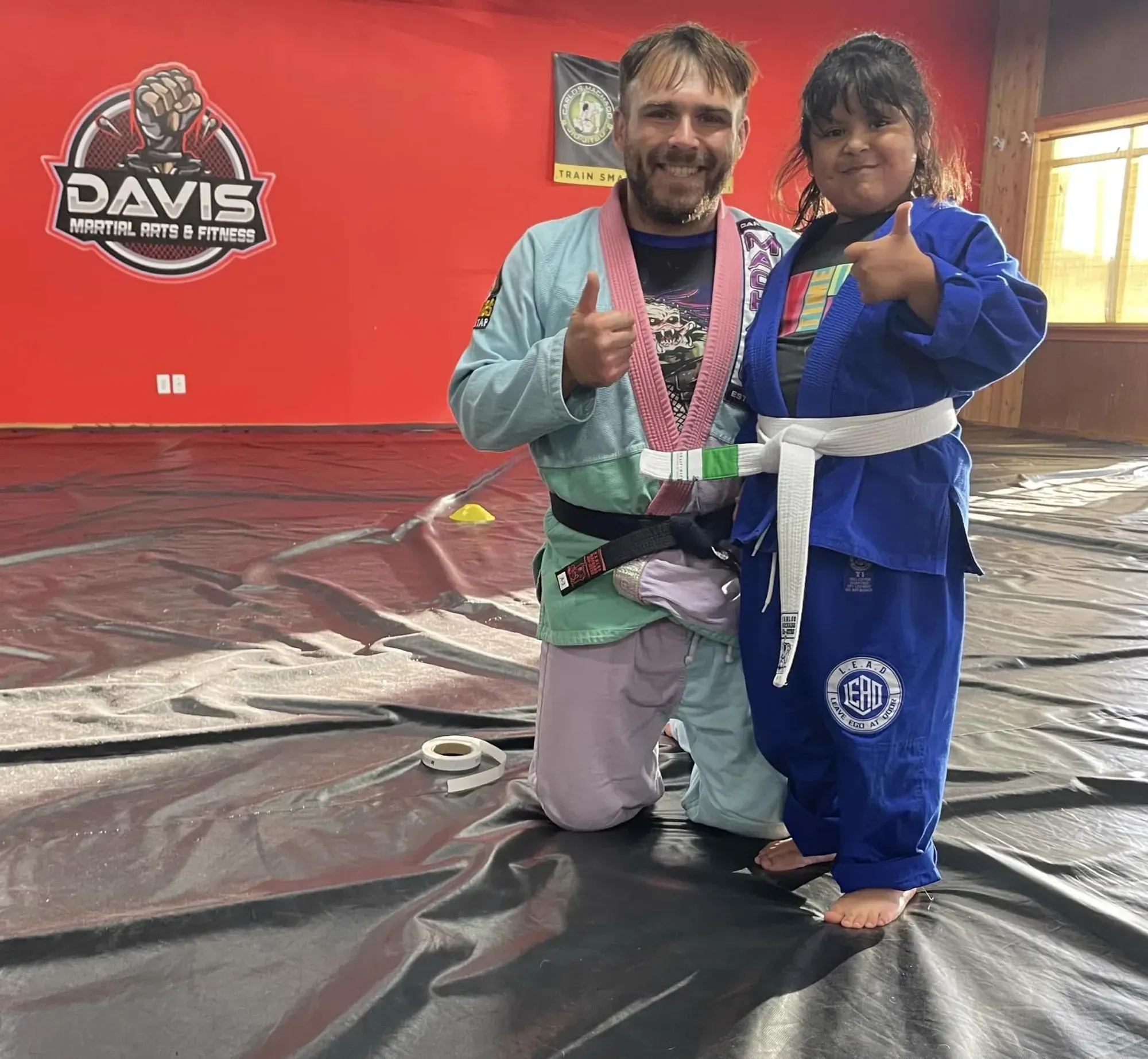 Cameron Davis teaching the Kids Brazilian Jiu-Jitsu program at Davis Martial Arts & Fitness in Pilot Point, TX