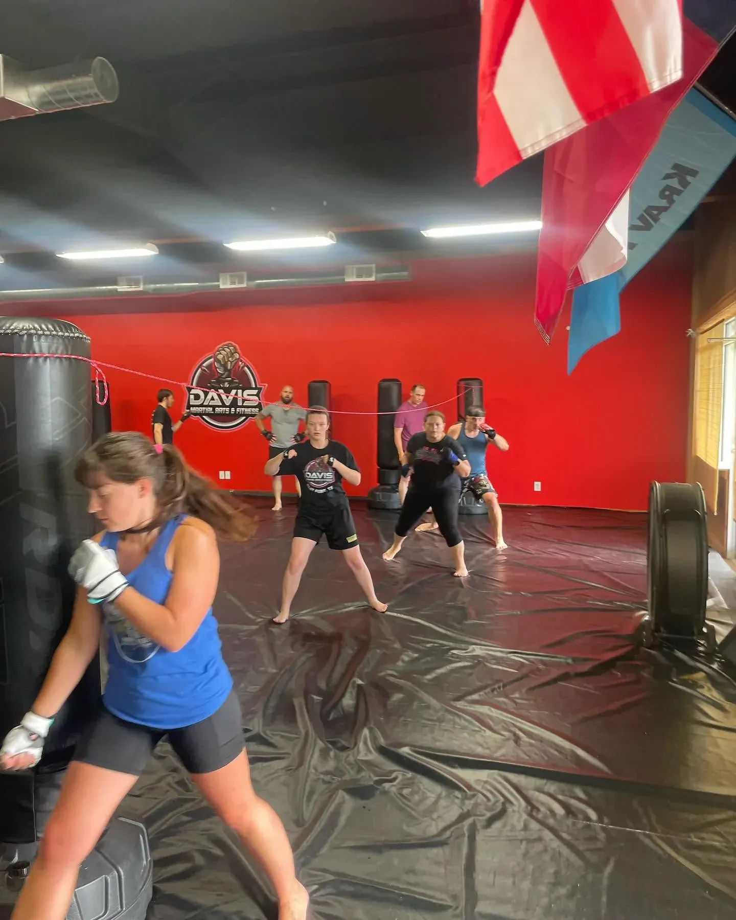 Two students training striking with pads at Davis Martial Arts & Fitness in Pilot Point