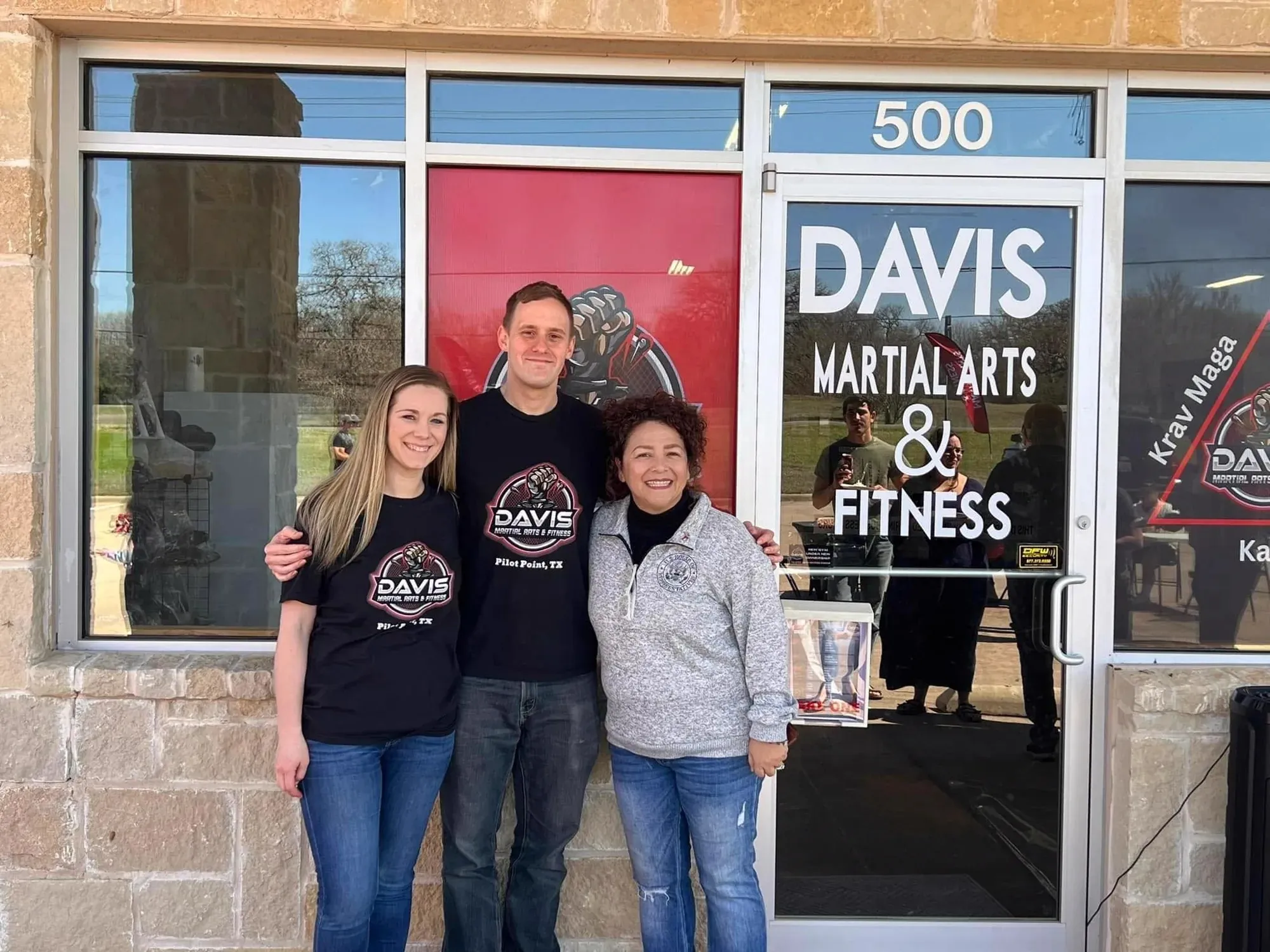 New family being welcomed at Davis Martial Arts & Fitness in Pilot Point